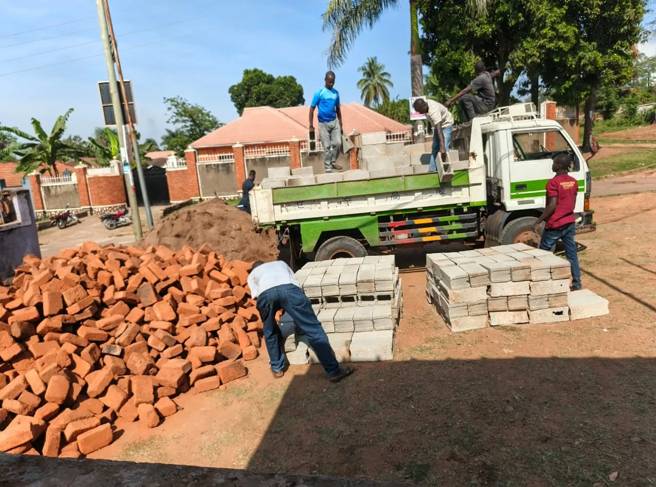 Bricks and blocks being offloaded from a truck